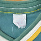 NFL Clothing > Gender Neutral Adult Clothing > Tops & Tees > T Shirts Vintage 1980s Green Bay Packers NFL Graphic T-Shirt Youth M