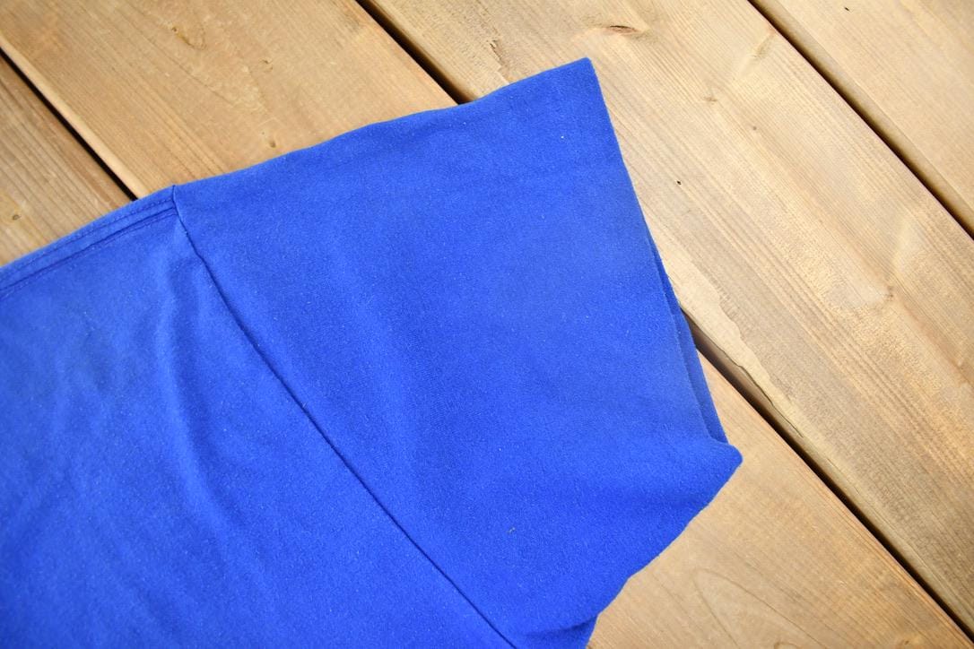 NFL Clothing > Gender Neutral Adult Clothing > Tops & Tees > T Shirts Vintage 1980s New York Giants NFL T-shirt Men's Large