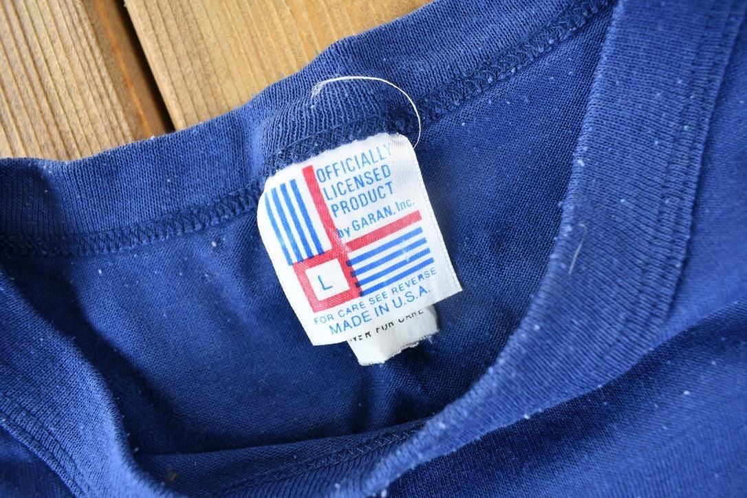 NFL Clothing > Gender Neutral Adult Clothing > Tops & Tees > T Shirts Vintage 1989 New York Giants NFL Super Bowl Champions T-shirt Men's Large