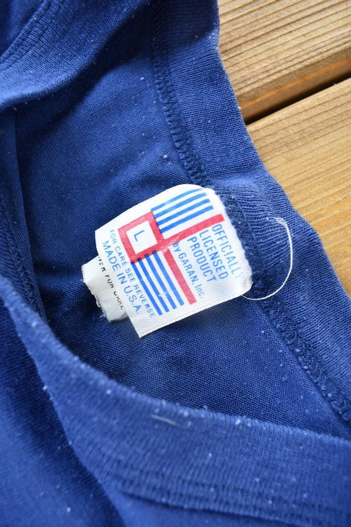 NFL Clothing > Gender Neutral Adult Clothing > Tops & Tees > T Shirts Vintage 1989 New York Giants NFL Super Bowl Champions T-shirt Men's Large