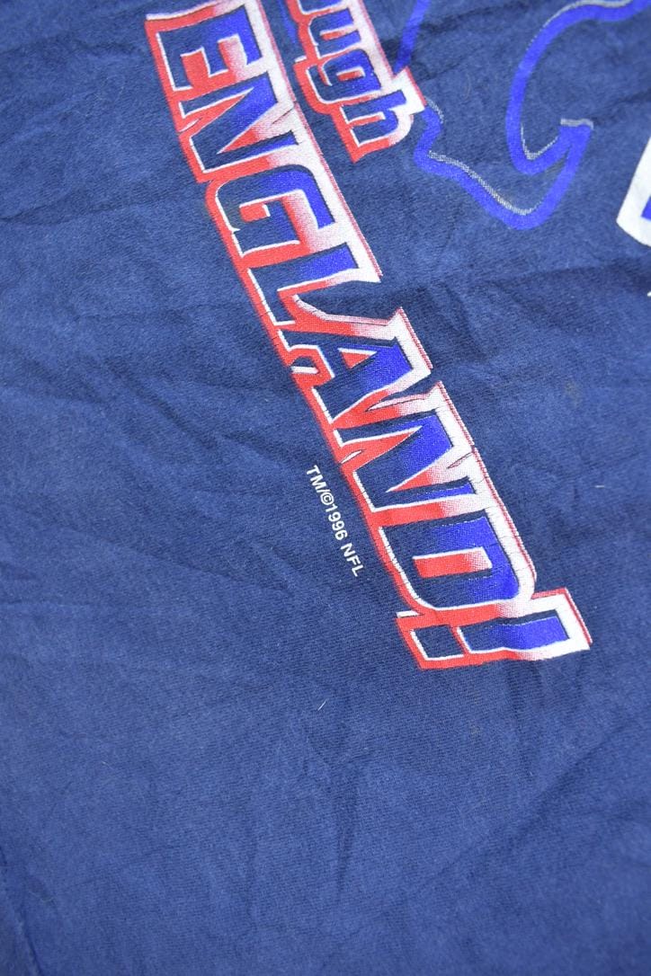 NFL Clothing > Gender Neutral Adult Clothing > Tops & Tees > T Shirts Vintage 1990a New England Patriots Pro Player Sportswear Graphic T-shirt Men's Large