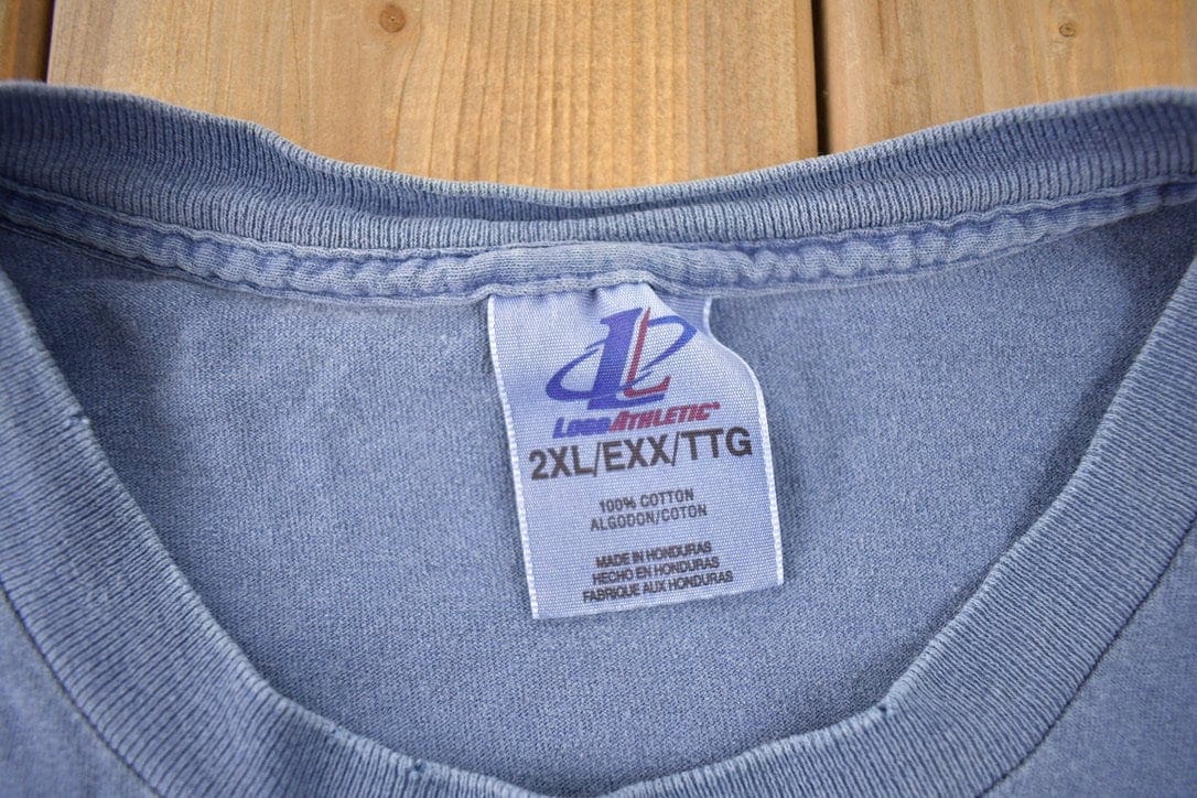 NFL Clothing > Gender Neutral Adult Clothing > Tops & Tees > T Shirts Vintage 1990s Chicago Bears NFL Football Graphic T-Shirt Men's XXL