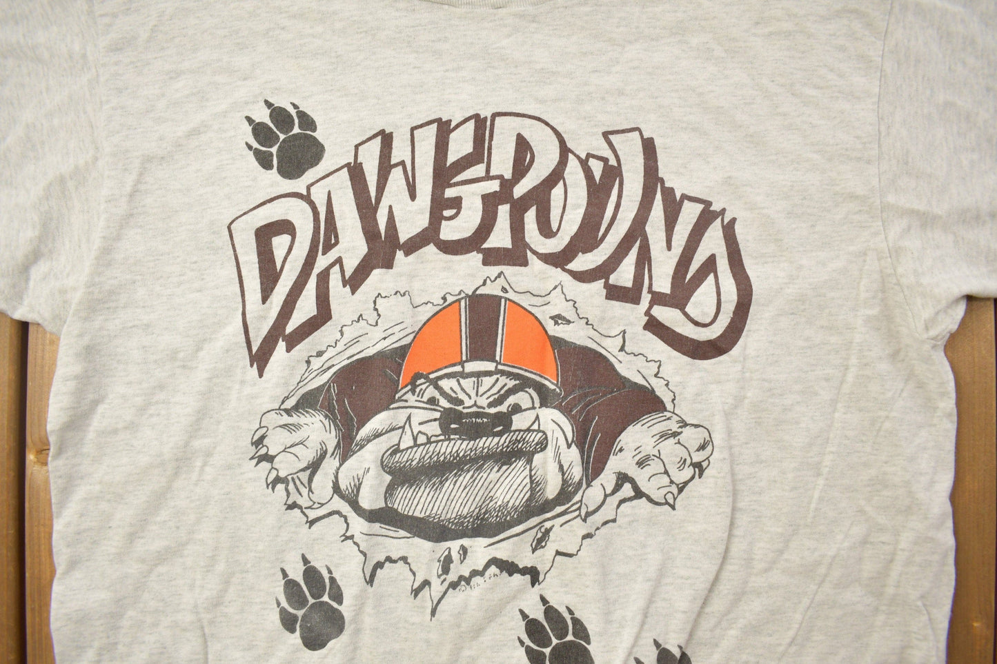 NFL Clothing > Gender Neutral Adult Clothing > Tops & Tees > T Shirts Vintage 1990s Cleveland Browns Dawgpoud NFL Graphic T-ShirtMen's Large