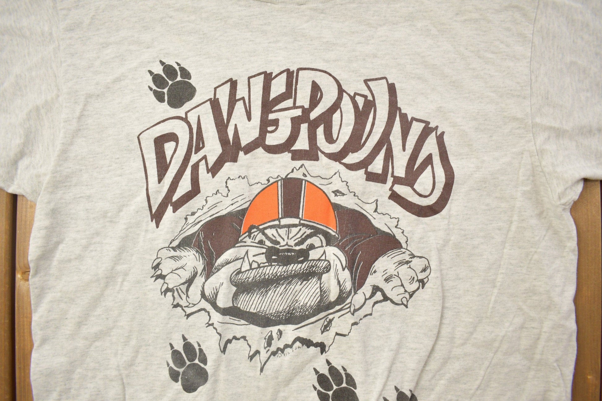 NFL Clothing > Gender Neutral Adult Clothing > Tops & Tees > T Shirts Vintage 1990s Cleveland Browns Dawgpoud NFL Graphic T-ShirtMen's Large