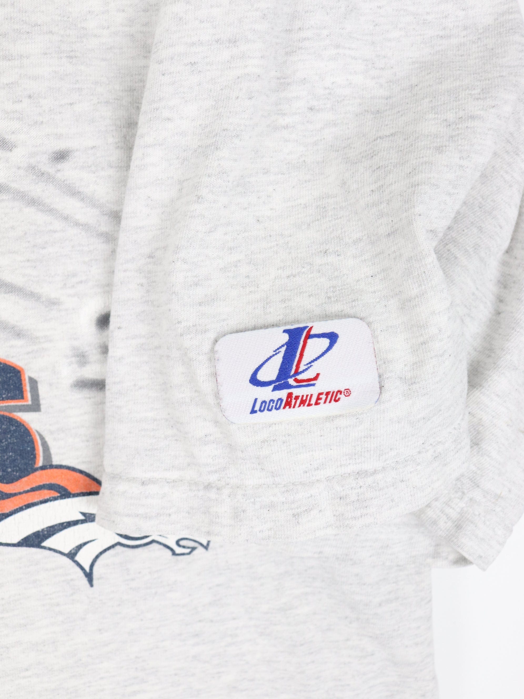 Love Sign x Denver Broncos T-Shirt from Homage. | Officially Licensed Vintage NFL Apparel from Homage Pro Shop.