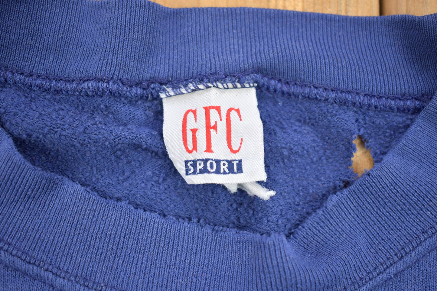 NHL Clothing > Gender Neutral Adult Clothing > Hoodies & Sweatshirts > Sweatshirts Vintage 1990s Columbus Blue Jackets NHL Distressed Crewneck Sweater Men's Small