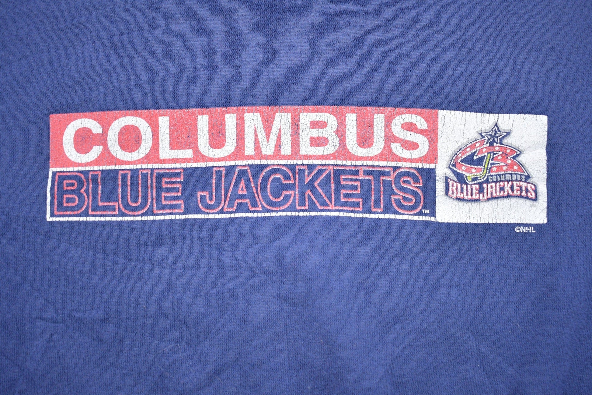 NHL Clothing > Gender Neutral Adult Clothing > Hoodies & Sweatshirts > Sweatshirts Vintage 1990s Columbus Blue Jackets NHL Distressed Crewneck Sweater Men's Small