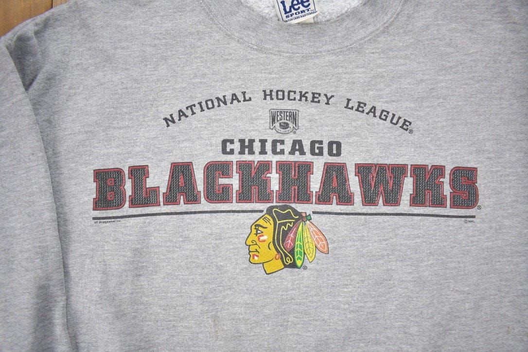 NHL Clothing > Gender Neutral Adult Clothing > Hoodies & Sweatshirts > Sweatshirts Vintage 1990s Lee Sport Chicago Blackhawks NHL Crewneck Sweatshirt Men's Large