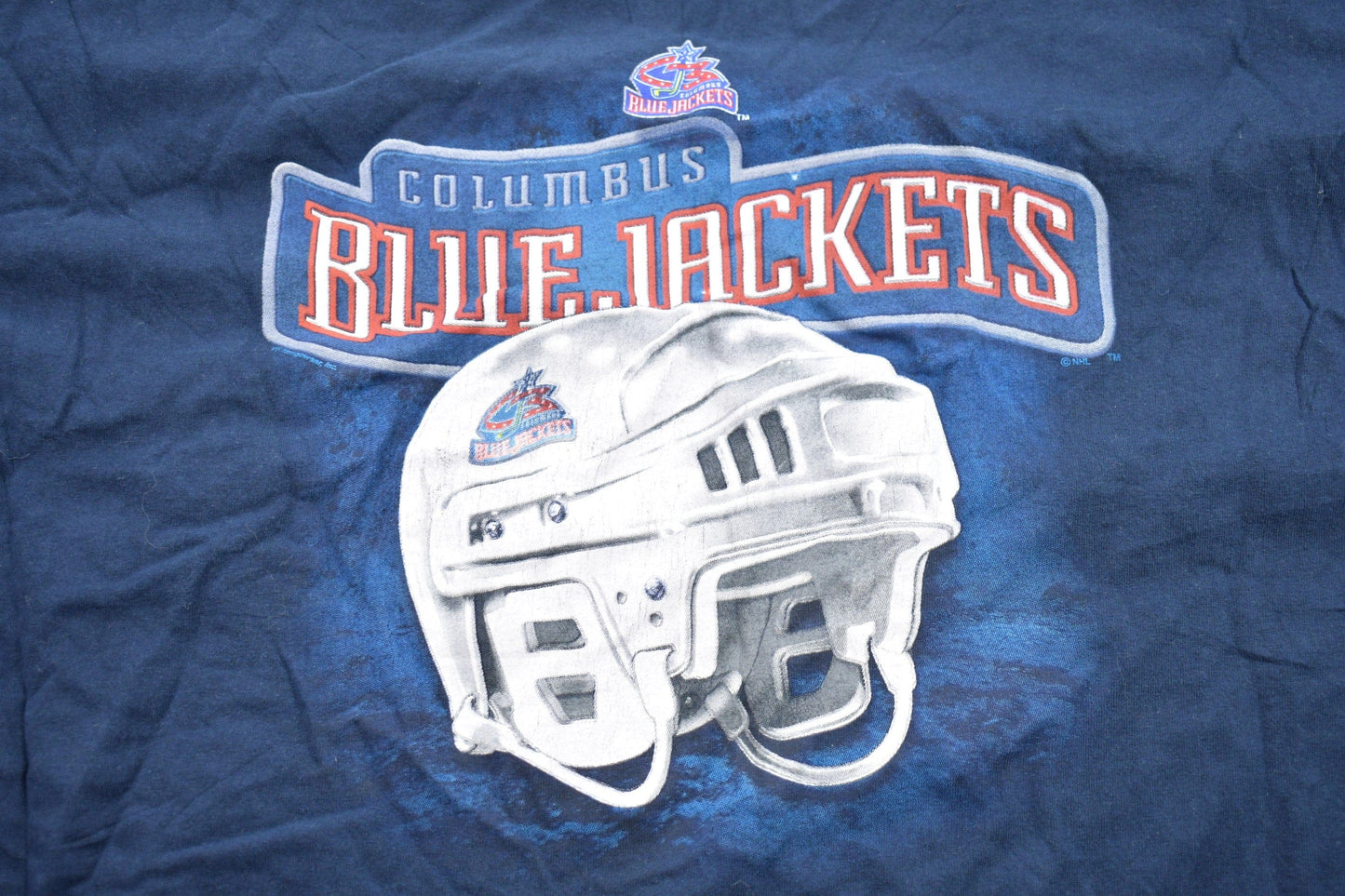NHL Clothing > Gender Neutral Adult Clothing > Tops & Tees > T Shirts Vintage 1990s Columbus Blue Jackets NHL Graphic T-Shirt Men's XL