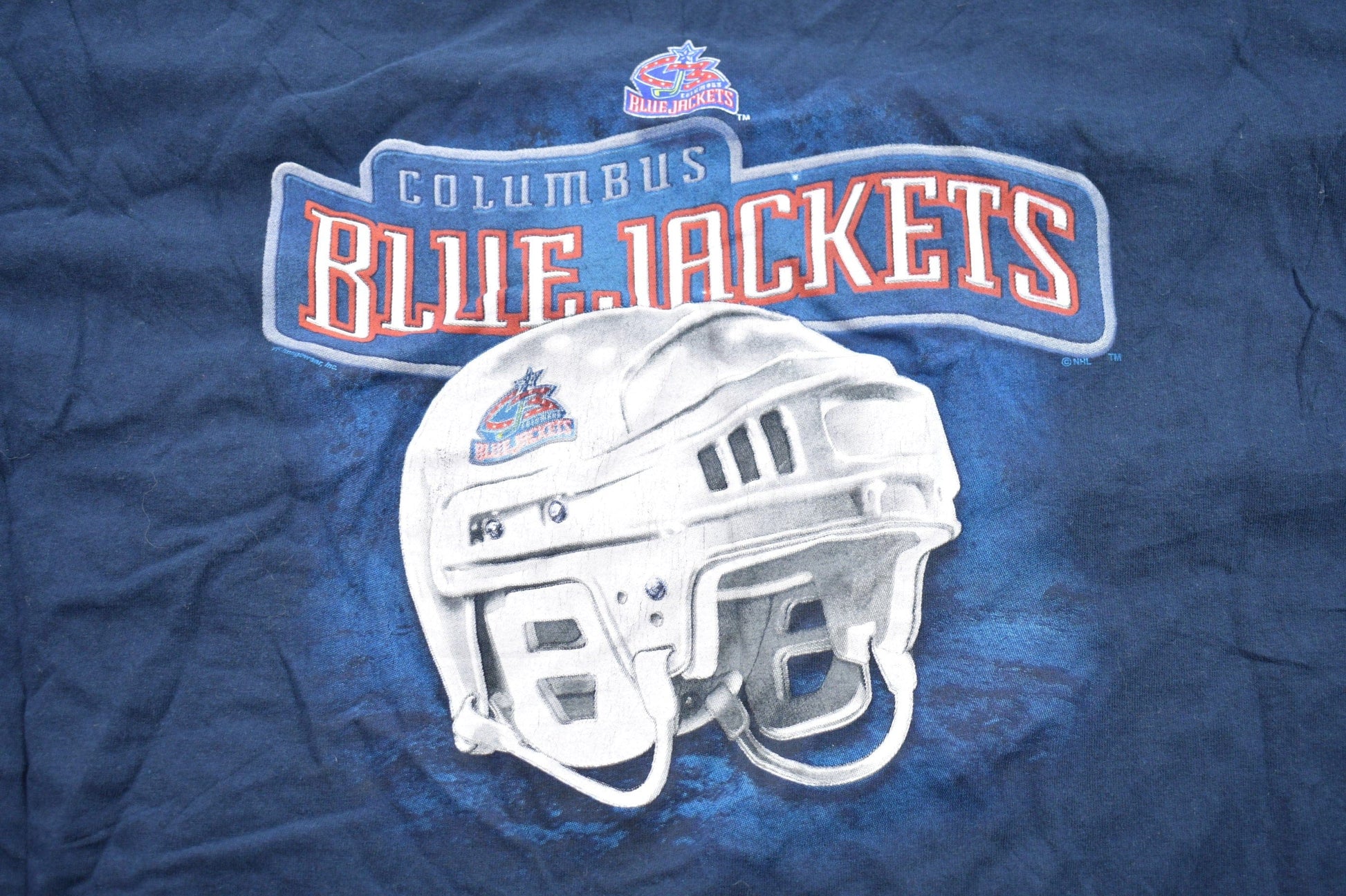 NHL Clothing > Gender Neutral Adult Clothing > Tops & Tees > T Shirts Vintage 1990s Columbus Blue Jackets NHL Graphic T-Shirt Men's XL