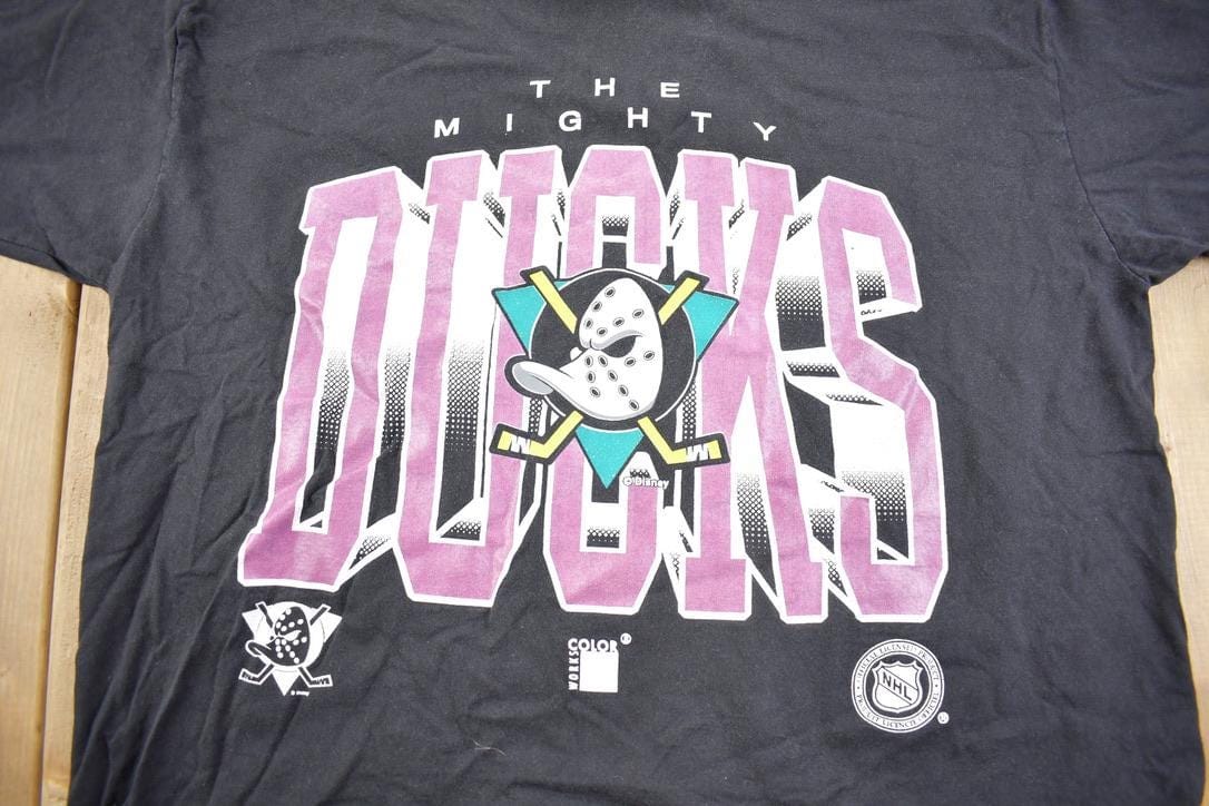 NHL Clothing > Gender Neutral Adult Clothing > Tops & Tees > T Shirts Vintage 1990s NHL The Mighty Ducks Graphic Cropped T Shirt Made In USA Men's XL