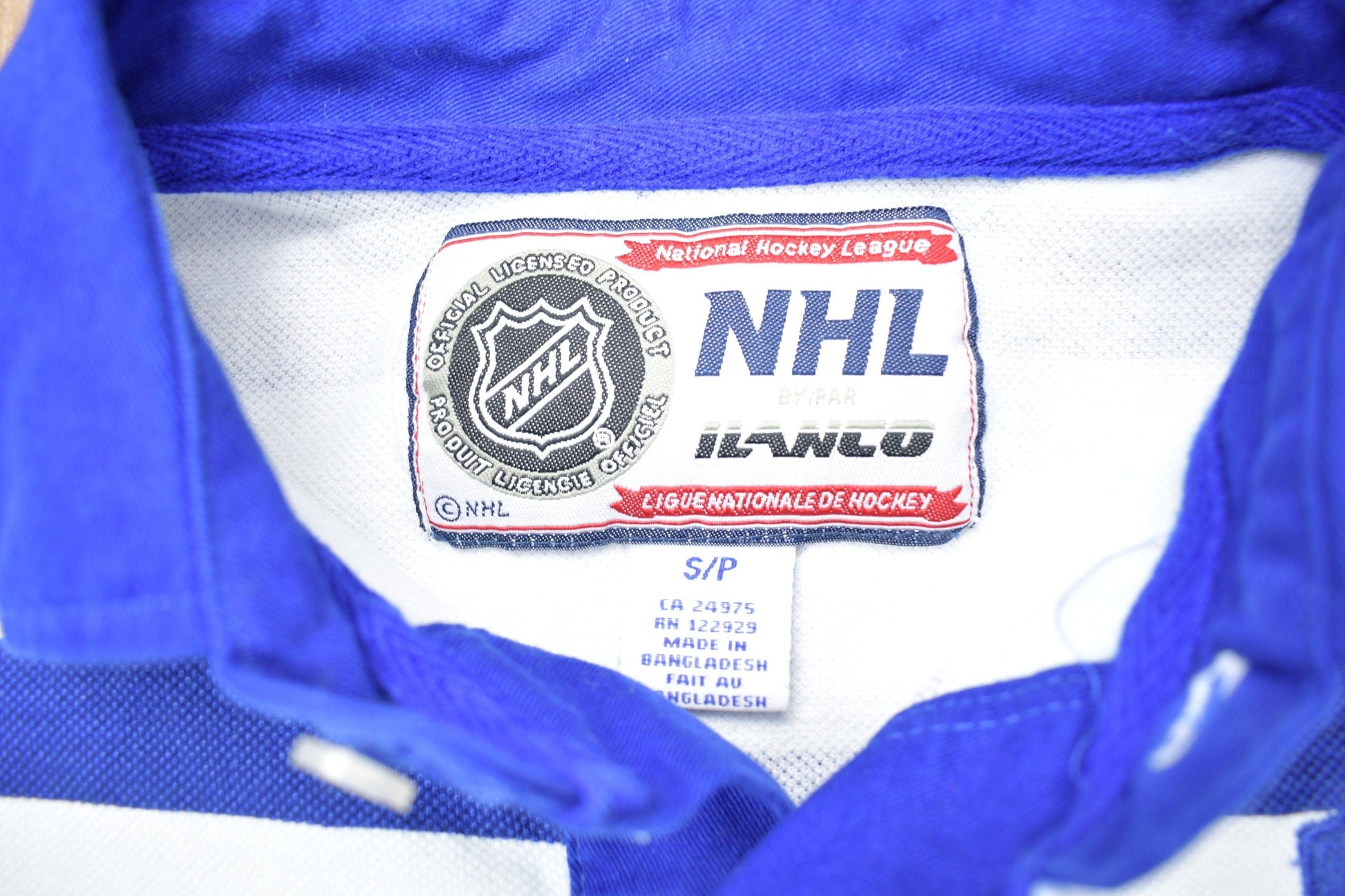 NHL Clothing > Gender Neutral Adult Clothing > Tops & Tees > T Shirts Vintage 1990s NHL Toronto Maple Leafs Striped Collared Shirt Men's Small