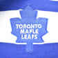 NHL Clothing > Gender Neutral Adult Clothing > Tops & Tees > T Shirts Vintage 1990s NHL Toronto Maple Leafs Striped Collared Shirt Men's Small
