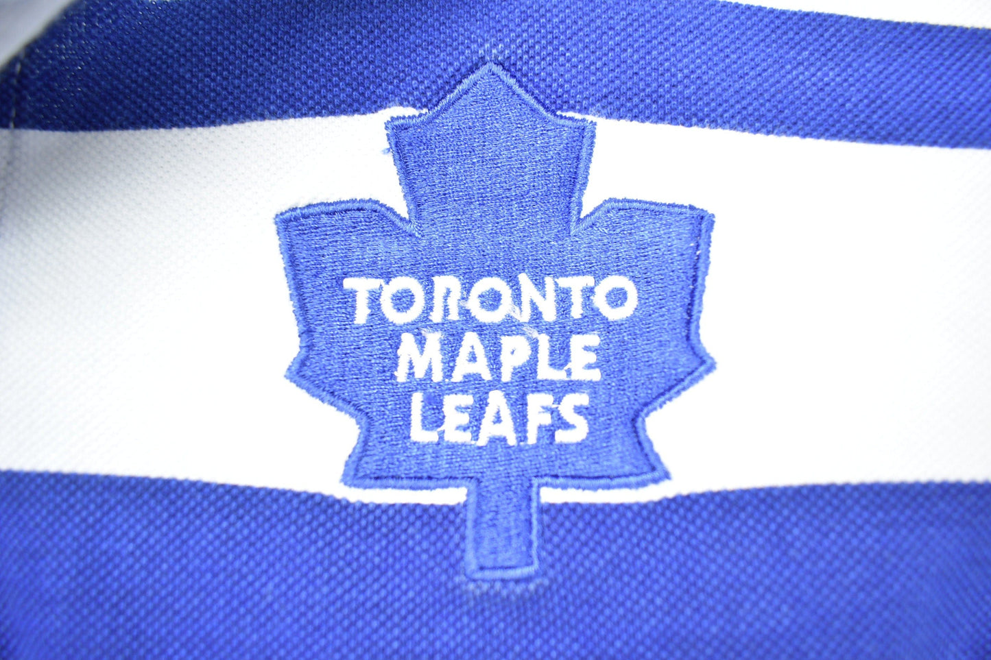 NHL Clothing > Gender Neutral Adult Clothing > Tops & Tees > T Shirts Vintage 1990s NHL Toronto Maple Leafs Striped Collared Shirt Men's Small