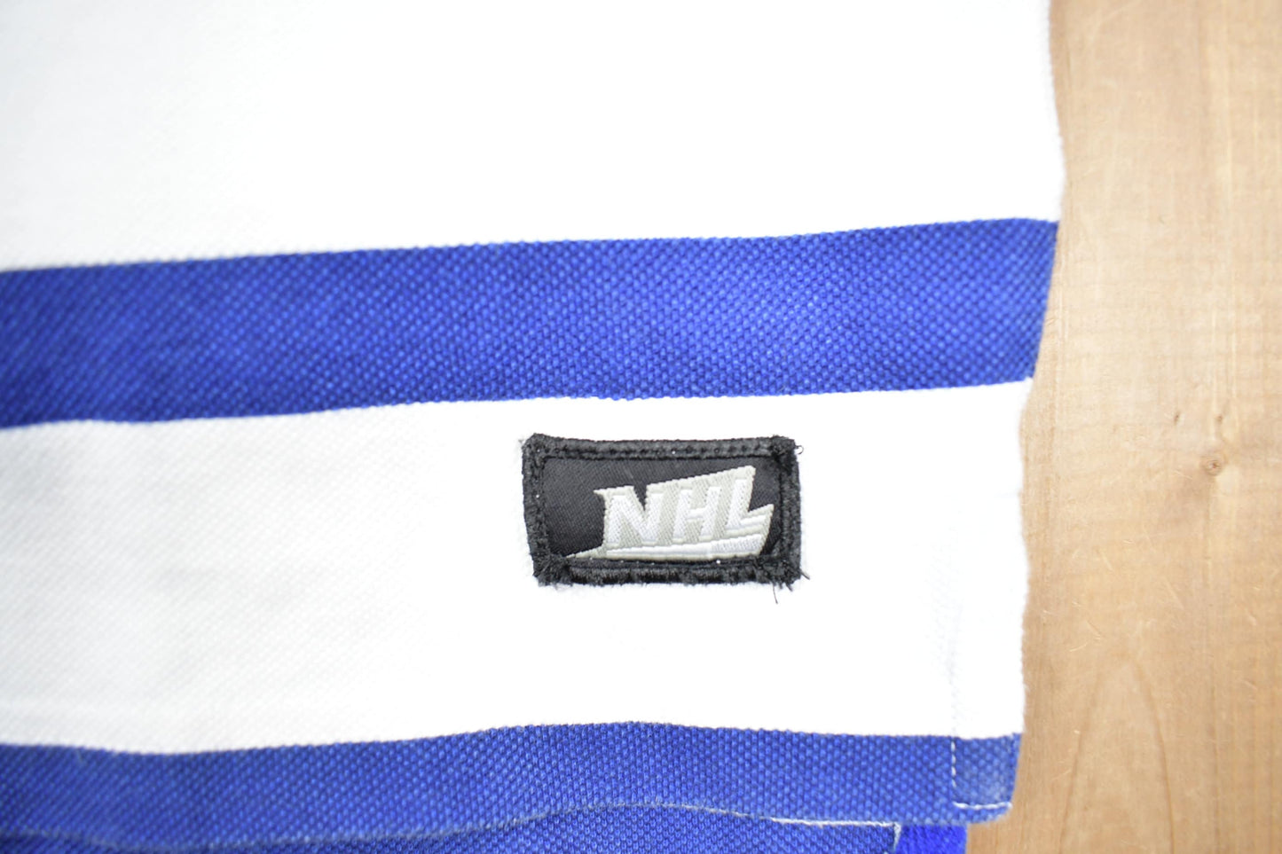 NHL Clothing > Gender Neutral Adult Clothing > Tops & Tees > T Shirts Vintage 1990s NHL Toronto Maple Leafs Striped Collared Shirt Men's Small