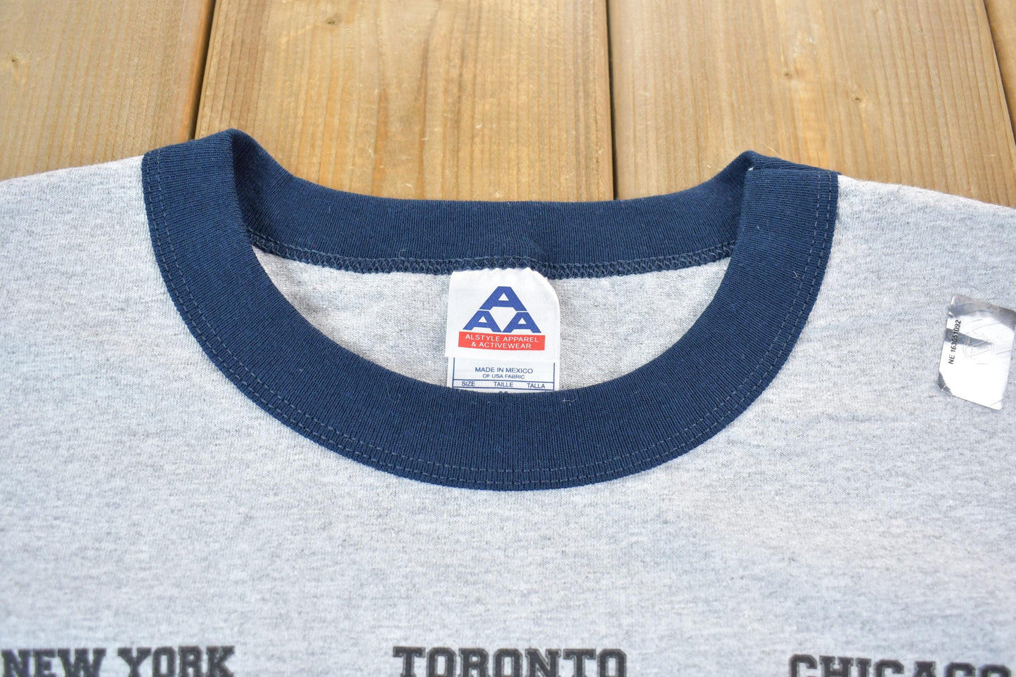 NHL Clothing > Gender Neutral Adult Clothing > Tops & Tees > T Shirts Vintage 1990s Original Six NHL Hockey Classic Dead Stock Graphic T-Shirt Men's Medium