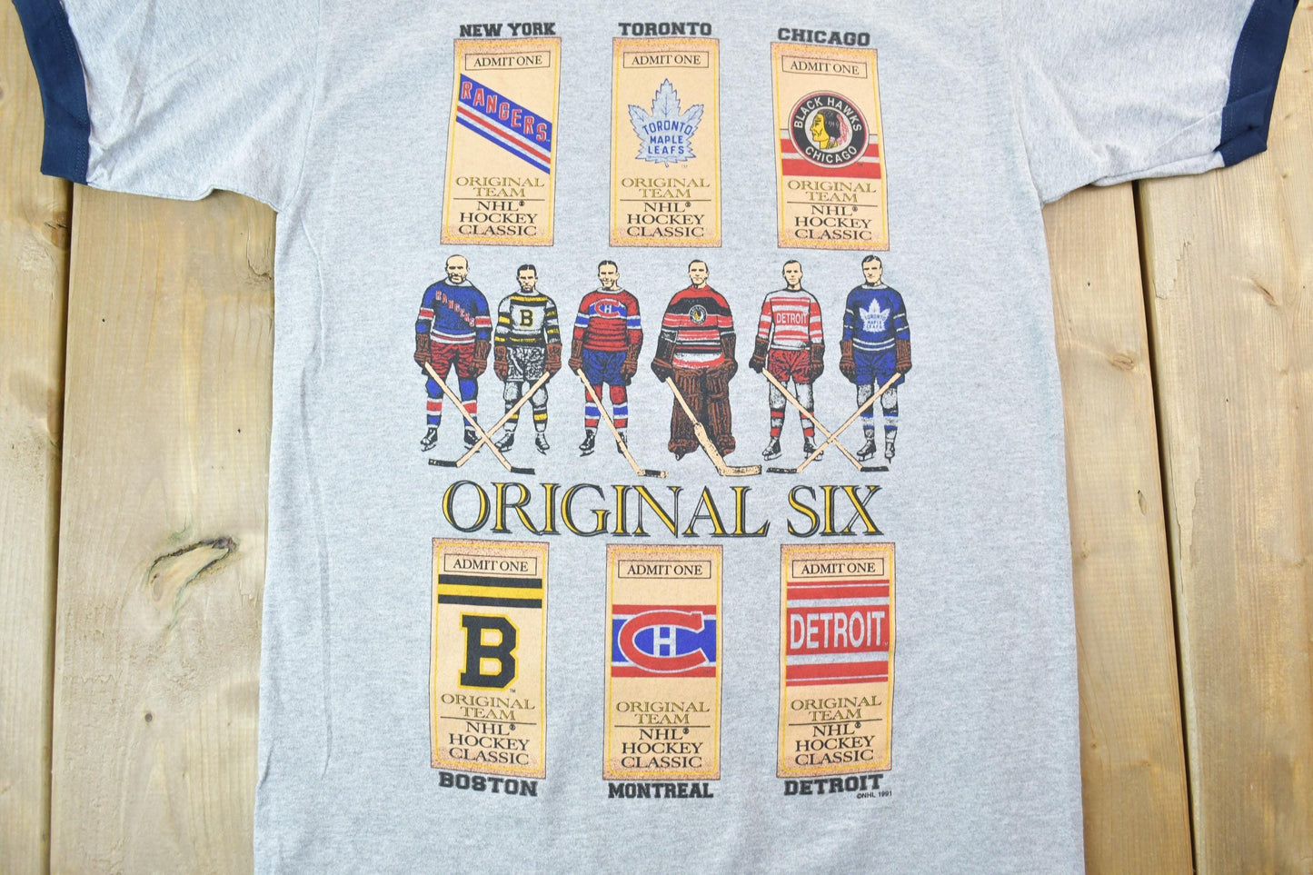 NHL Clothing > Gender Neutral Adult Clothing > Tops & Tees > T Shirts Vintage 1990s Original Six NHL Hockey Classic Dead Stock Graphic T-Shirt Men's Medium