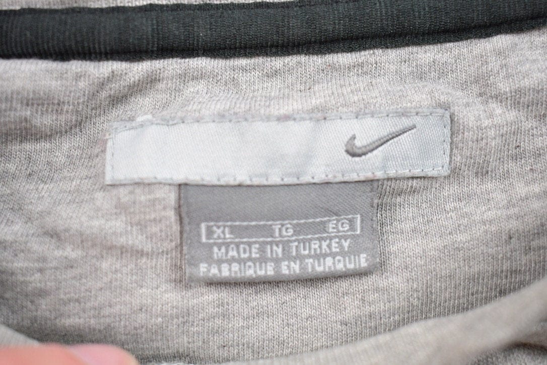 Nike Clothing > Gender Neutral Adult Clothing > Hoodies & Sweatshirts > Sweatshirts Vintage 1990s Nike Embroidered Mini Swoosh Crewneck Sweatshirt Men's XL