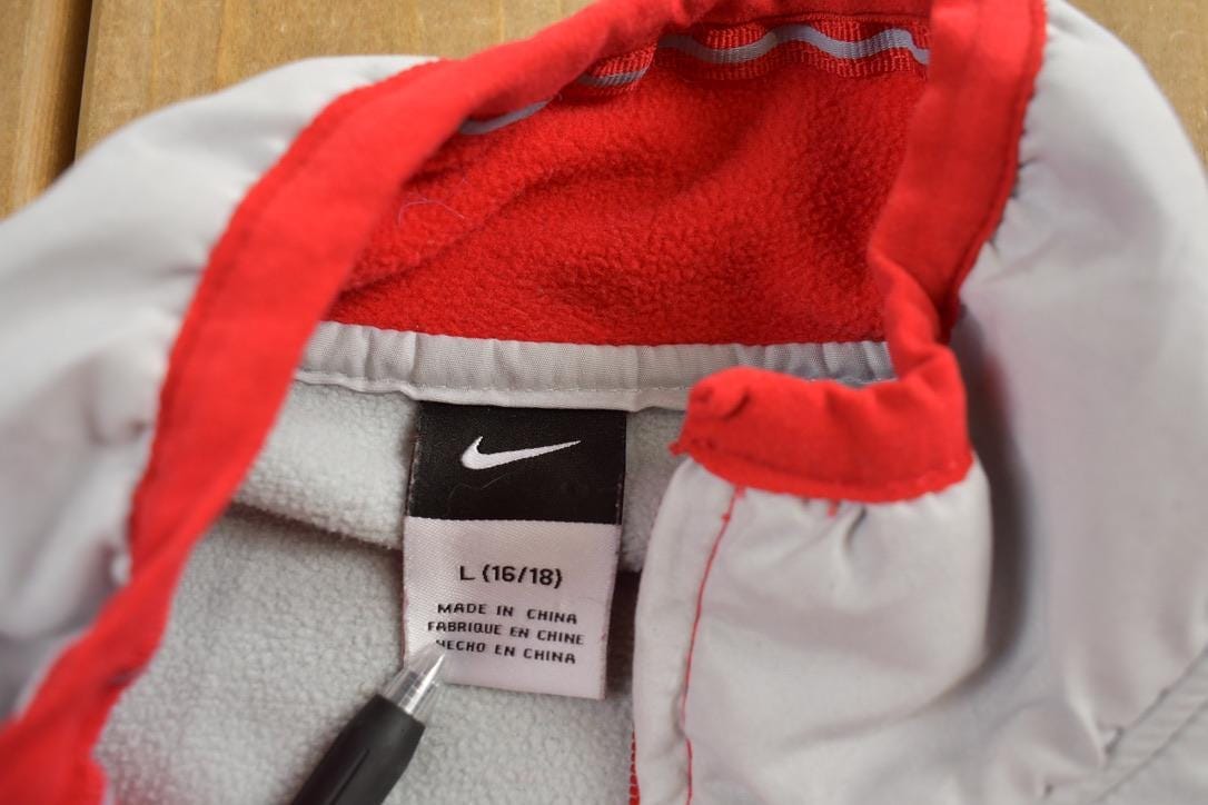 Nike Clothing > Gender Neutral Adult Clothing > Hoodies & Sweatshirts > Sweatshirts Vintage 1990s Ohio State University Buckeyes Collegiate Zip Up Nike Fleece Sweater Men's M