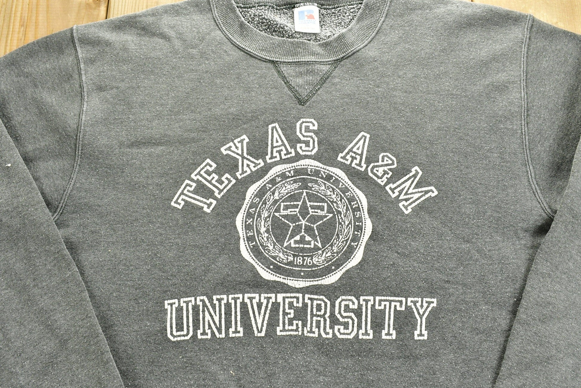 Other Clothing > Gender Neutral Adult Clothing > Hoodies & Sweatshirts > Sweatshirts Vintage 1980s University of Texas A&M Collegiate Crewneck / Russell Athletics / Made In USA / NCAA Sweatshirt / Sportswear / Americana