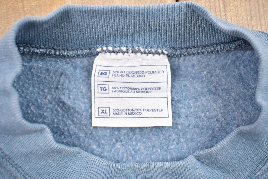 Other Clothing > Gender Neutral Adult Clothing > Hoodies & Sweatshirts > Sweatshirts Vintage 1990s Blank Blue Crewneck Sweatshirt / 90s Crewneck / Made In USA / Essential / Streetwear / 90s Blank