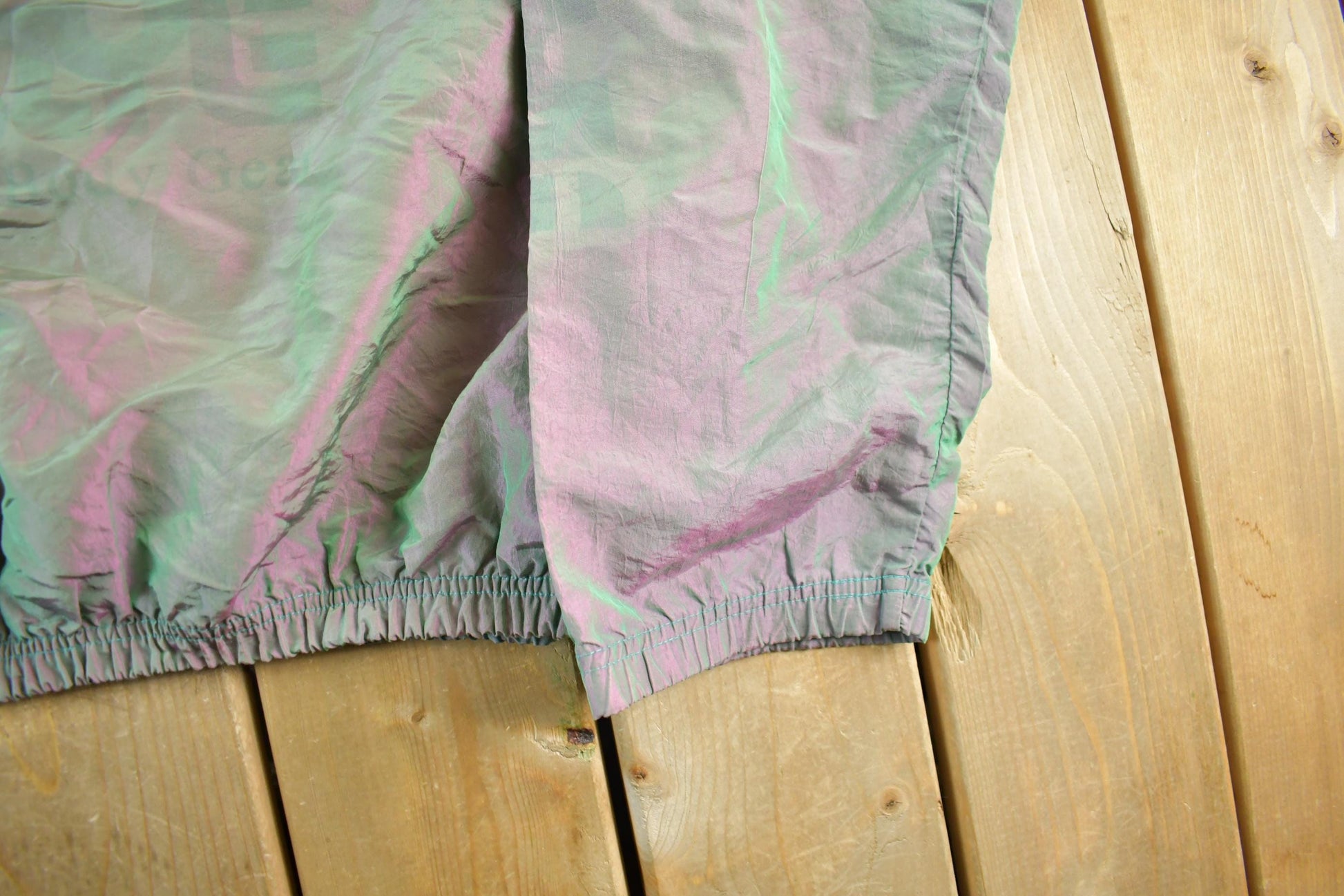 Other Clothing > Gender Neutral Adult Clothing > Jackets & Coats Vintage 1990s Surf's Up International Body Gear Iridescent Windbreaker Jacket Men's XL