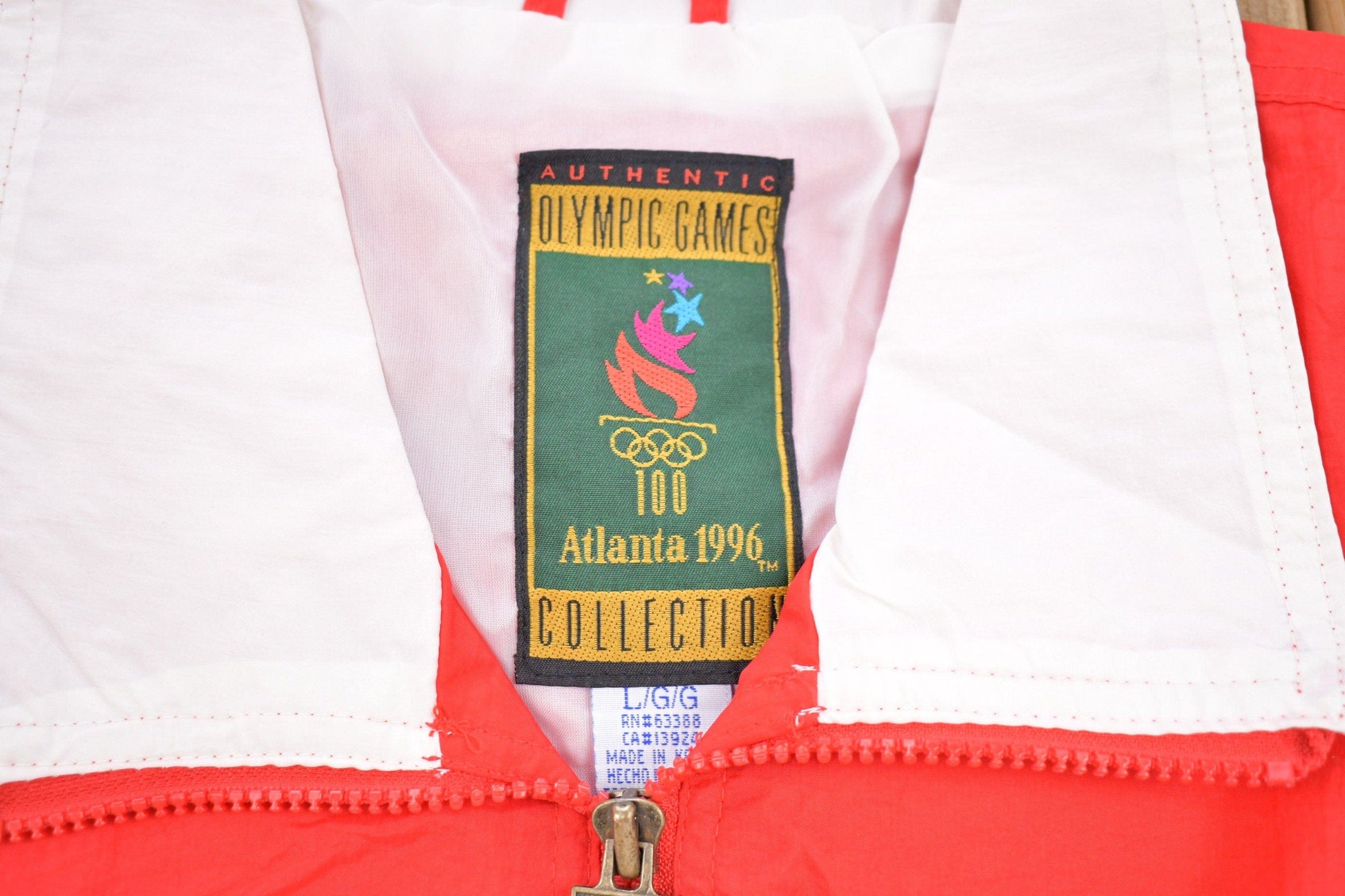 Other Clothing > Gender Neutral Adult Clothing > Jackets & Coats Vintage 1996 Atlanta Olympics All Over Print Windbreaker Jacket Men's L