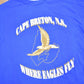 Other Clothing > Gender Neutral Adult Clothing > Tops & Tees > T Shirts Vintage 1980s Cape Breton Nova Scotia Where Eagles Fly Graphic T-Shirt Men's Medium