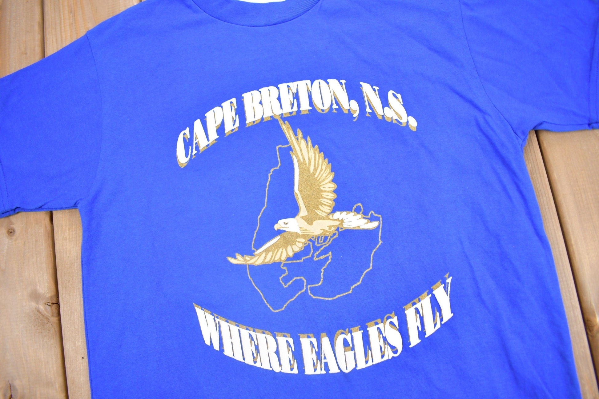 Other Clothing > Gender Neutral Adult Clothing > Tops & Tees > T Shirts Vintage 1980s Cape Breton Nova Scotia Where Eagles Fly Graphic T-Shirt Men's Medium