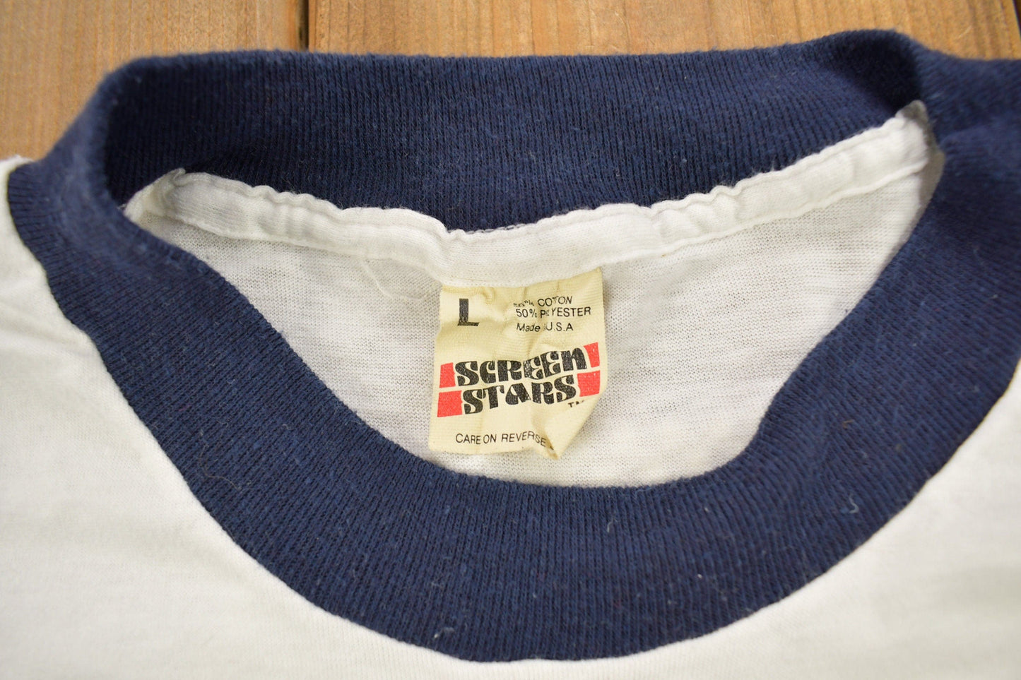 Other Clothing > Gender Neutral Adult Clothing > Tops & Tees > T Shirts Vintage 1982 Minnesota Voyageur Trail Ultra Souvenir Ringer T-Shirt Men's Medium