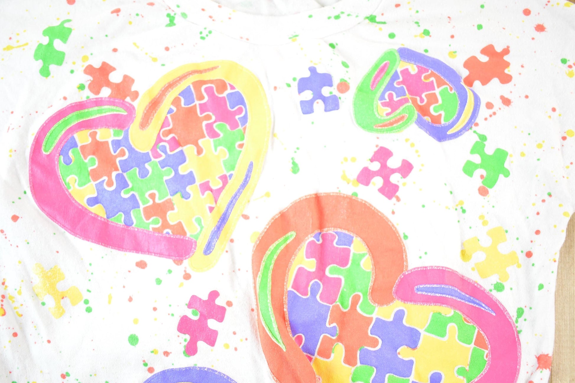 Other Clothing > Gender Neutral Adult Clothing > Tops & Tees > T Shirts Vintage 1990s Andover Togs Puzzle Hearts Souvenir All Over Print T-Shirt Women's S