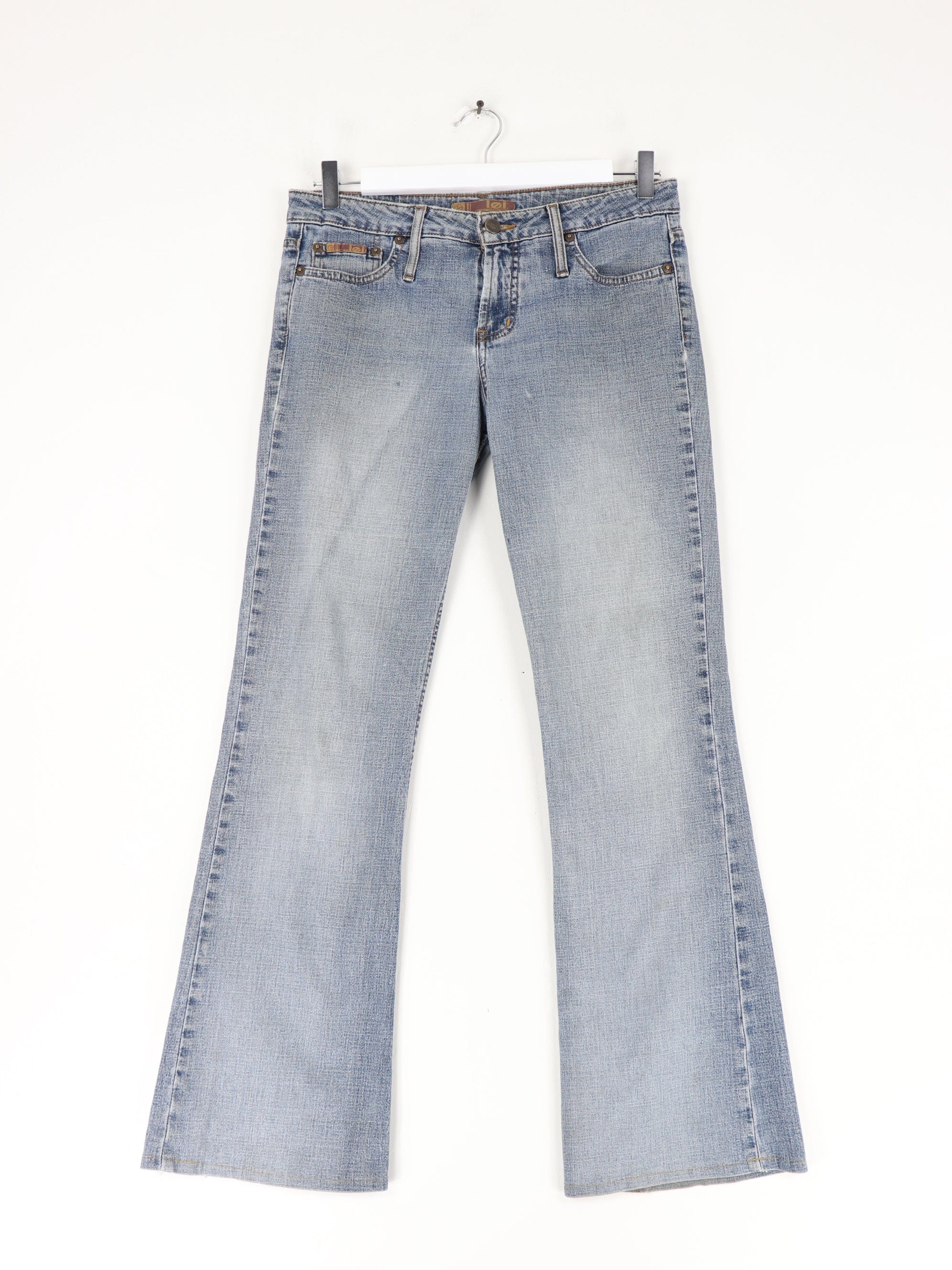 https://propervintagecanada.com/cdn/shop/files/other-jeans-vintage-l-e-i-pants-womens-9-blue-low-rise-y2k-bootcut-flare-denim-jeans-31208356642875.jpg?v=1685838916