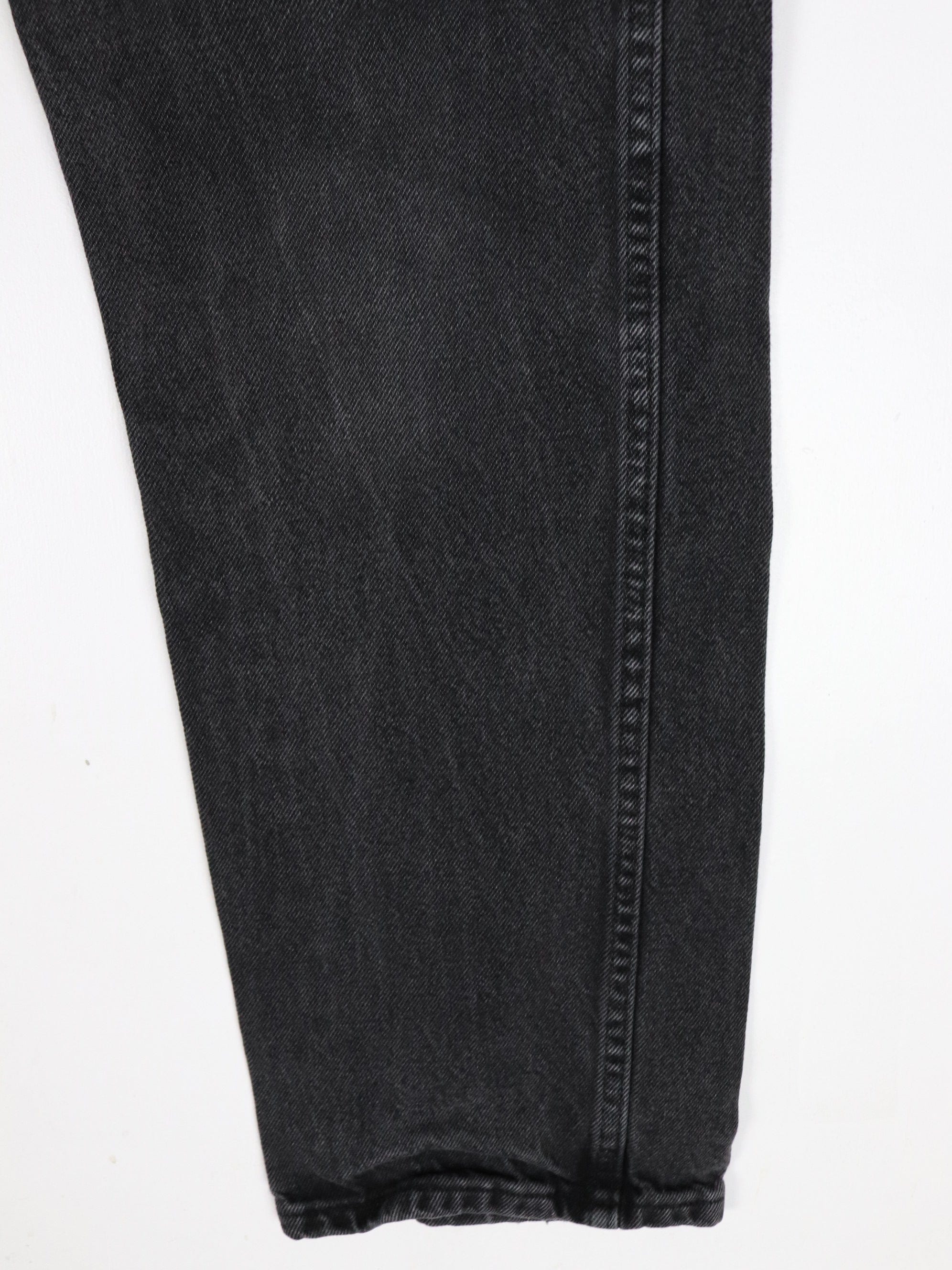 https://propervintagecanada.com/cdn/shop/files/other-jeans-vintage-rustler-pants-mens-33-x-30-black-denim-jeans-31724117262395.jpg?v=1702339146