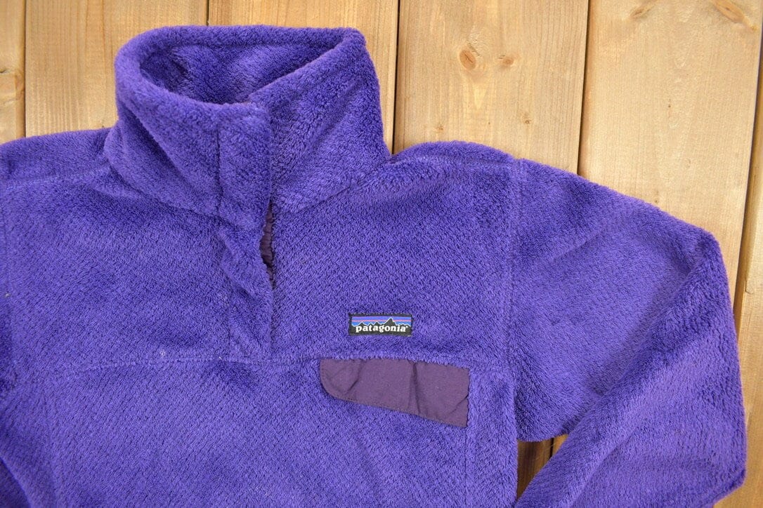 Patagonia Clothing > Gender Neutral Adult Clothing > Hoodies & Sweatshirts > Sweatshirts Vintage 1990s Patagonia Outdoor Quarter Button Snap Fleece Women's S