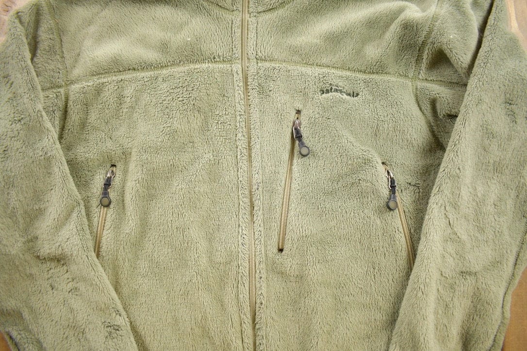 Patagonia Clothing > Gender Neutral Kids' Clothing > Hoodies & Sweatshirts > Sweatshirts Vintage 1990s Patagonia Green Fleece Sweater Men's Large