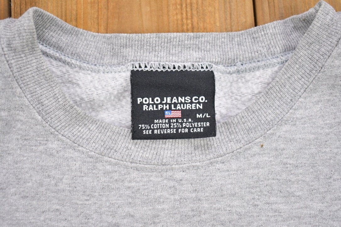 Polo Clothing > Gender Neutral Adult Clothing > Hoodies & Sweatshirts > Sweatshirts Vintage 1990s Ralph Lauren Polo Jeans Crewneck Sweatshirt Women's M