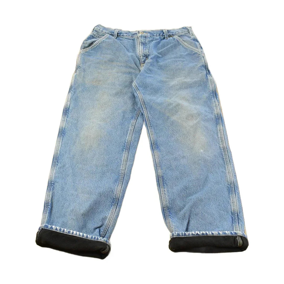 Vintage 2000s Carhartt Fleece Lined Denim Work Jeans Men's 35 x 31 from propervintagecanada