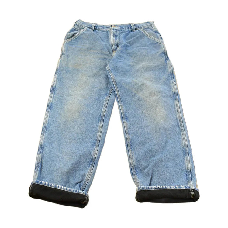 Vintage 2000s Carhartt Fleece Lined Denim Work Jeans Men's 35 x 31 from propervintagecanada
