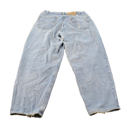 Vintage 1990s Distressed Levi's 560 Loose Fit Denim Blue Jeans Men's 32 x 26.5