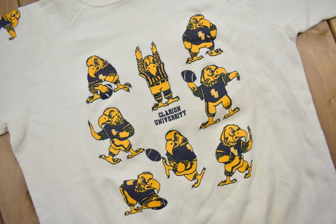 Proper Vintage Clothing > Gender Neutral Adult Clothing > Hoodies & Sweatshirts > Sweatshirts Vintage 1980s Clarion University Collegiate Crewneck / Made In USA / NCAA Sweatshirt / Sportswear / Americana / Jansport