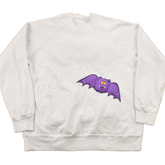 Proper Vintage Clothing > Gender Neutral Adult Clothing > Hoodies & Sweatshirts > Sweatshirts Vintage 1980s Halloween Patchwork Raglan Crewneck Sweatshirt / 90s Crewneck / Souvenir / Athleisure / Spooky Sweater / Made In USA