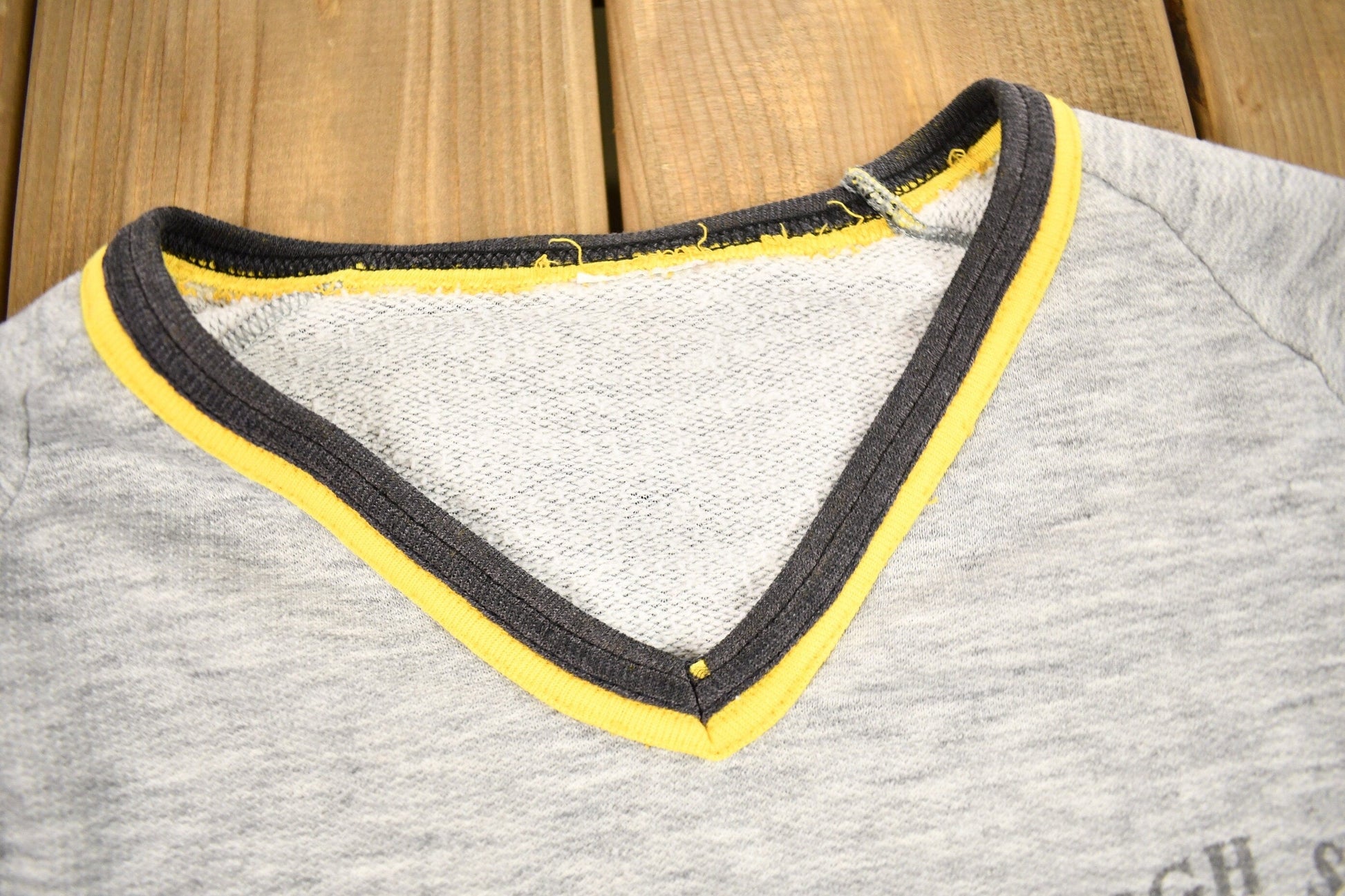 Proper Vintage Clothing > Gender Neutral Adult Clothing > Hoodies & Sweatshirts > Sweatshirts Vintage 1980s Pittsburgh Steelers NFL Staff Sweatshirt / Made In USA / Vintage Football / Sportswear / Americana / Raglan Sweater