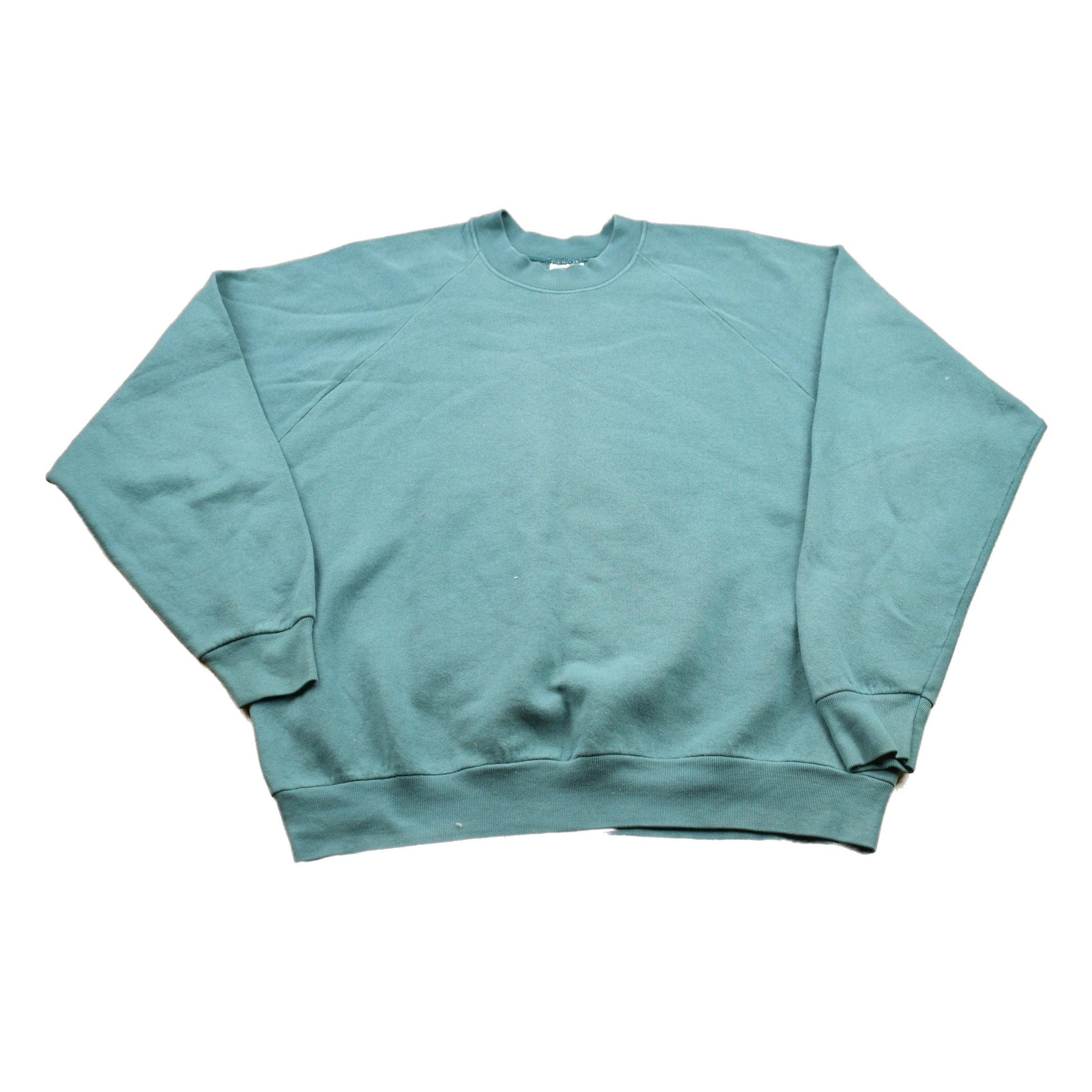 Proper Vintage Clothing > Gender Neutral Adult Clothing > Hoodies & Sweatshirts > Sweatshirts Vintage 1990s Blank Turquoise Crewneck Sweatshirt / 90s Crewneck / Made In USA / Essential / Streetwear / 90s Blank / Basic Crewneck