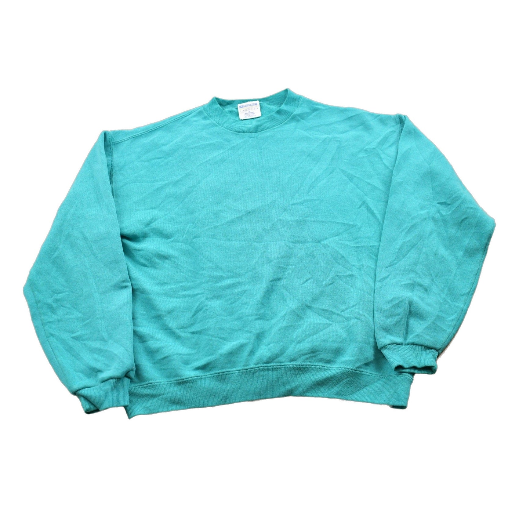 Proper Vintage Clothing > Gender Neutral Adult Clothing > Hoodies & Sweatshirts > Sweatshirts Vintage 1990s Blank Turquoise Crewneck Sweatshirt / 90s Crewneck / Made In USA / Essential / Streetwear / 90s Blank / Cheetah Mervvns