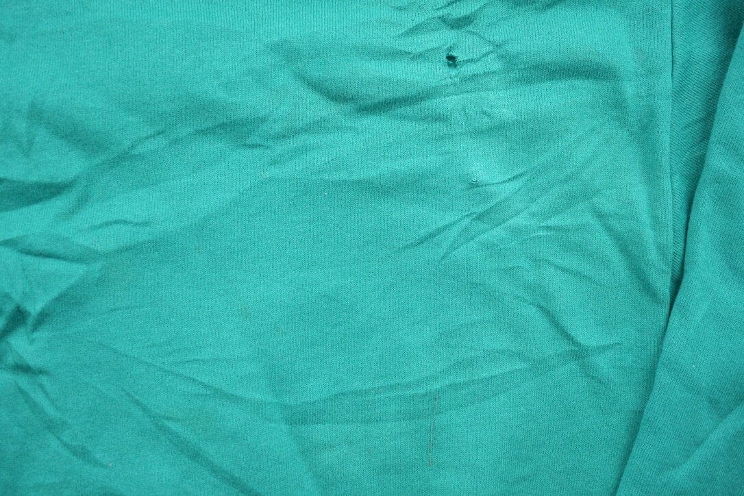 Proper Vintage Clothing > Gender Neutral Adult Clothing > Hoodies & Sweatshirts > Sweatshirts Vintage 1990s Blank Turquoise Crewneck Sweatshirt / 90s Crewneck / Made In USA / Essential / Streetwear / 90s Blank / Jerzees Blank