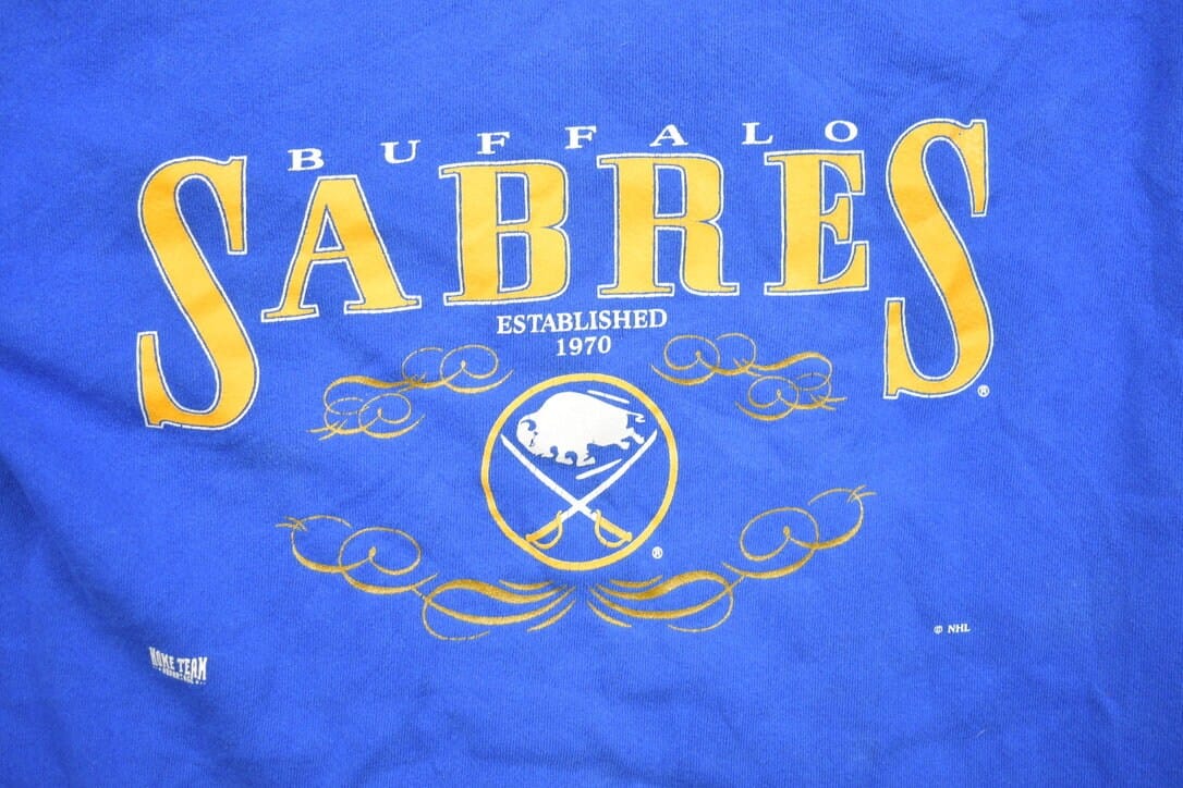Proper Vintage Clothing > Gender Neutral Adult Clothing > Hoodies & Sweatshirts > Sweatshirts Vintage 1990s Buffalo Sabres NHL Crewneck Sweatshirt / Made In USA / Hockey / Sportswear / Athleisure / Americana / CSA / Buffalo Vintage