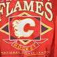Proper Vintage Clothing > Gender Neutral Adult Clothing > Hoodies & Sweatshirts > Sweatshirts Vintage 1990s Calgary Flames NHL Hockey Crewneck Sweatshirt / Made In USA / Vintage Sportswear / Embroidered / Men's XL