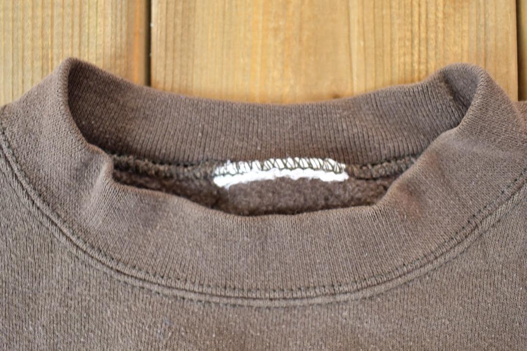 Proper Vintage Clothing > Gender Neutral Adult Clothing > Hoodies & Sweatshirts > Sweatshirts Vintage 1990s Cleveland Browns NFL Crewneck Sweatshirt / Made In USA / Football / Sportswear / Americana