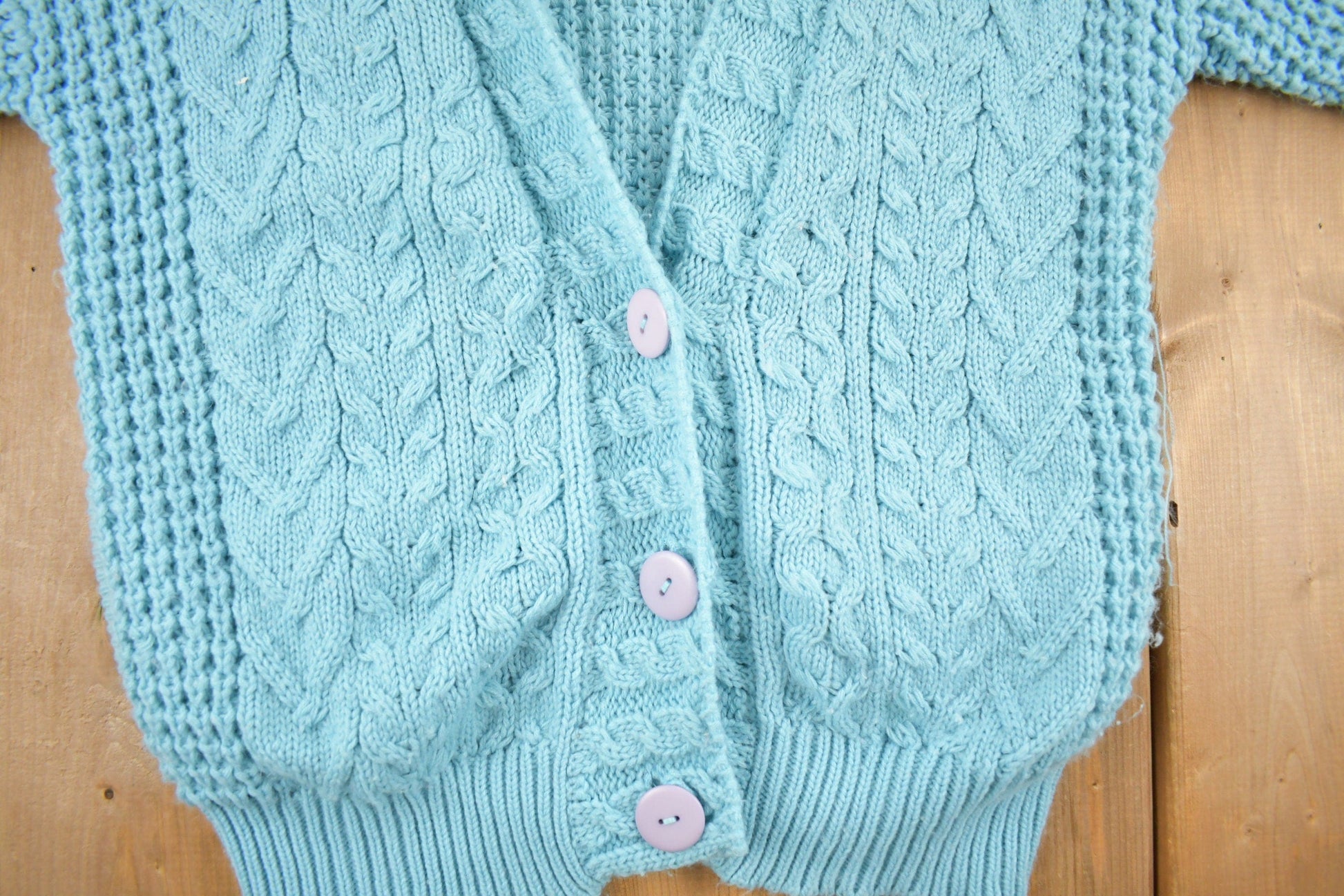 Proper Vintage Clothing > Gender Neutral Adult Clothing > Hoodies & Sweatshirts > Sweatshirts Vintage 1990s Evian Cable Knit Cardigan Sweater / Vintage Cardigan / Button Up / Patchwork / Embroidered / Acrylic