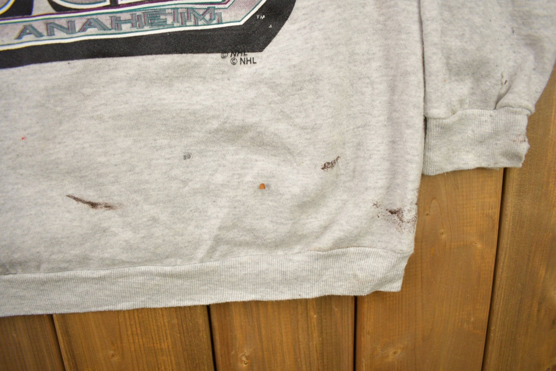 Proper Vintage Clothing > Gender Neutral Adult Clothing > Hoodies & Sweatshirts > Sweatshirts Vintage 1990s Mighty Ducks Of Anaheim NHL Logo 7 Crewneck Sweatshirt / Distressed / Sportswear / Athleisure / Americana / Made In USA